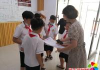 園校社區開展“創建文明城，我參與我快樂”小小志愿服務活動